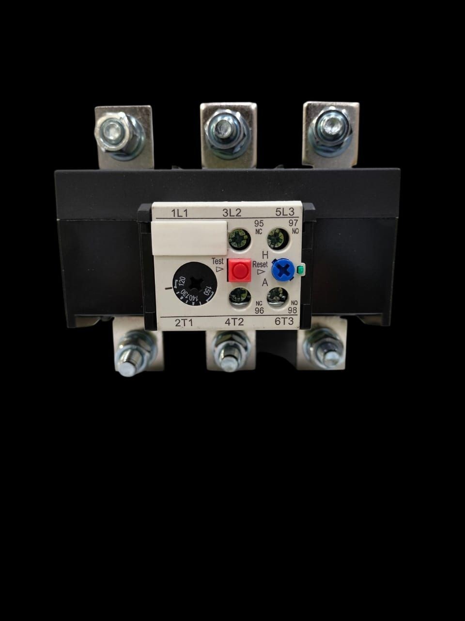 Close-up of an electrical component with knobs, screws, and labeled connections on a black background.